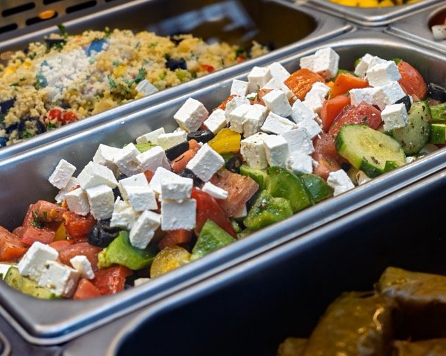 Amir food photography showing a large meat platter.